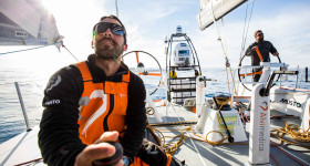 November 4, 2014. Leg 1 onboard Team Alvimedica. Day 24. With just 650 miles to Cape Town, the sailing slows considerably as a high-pressure system moves in from the west. The South Atlantic sun warms the crew, Mark Towill (L) and Charlie Enright (R), but it does nothing to help progress towards Cape Town in the light winds.